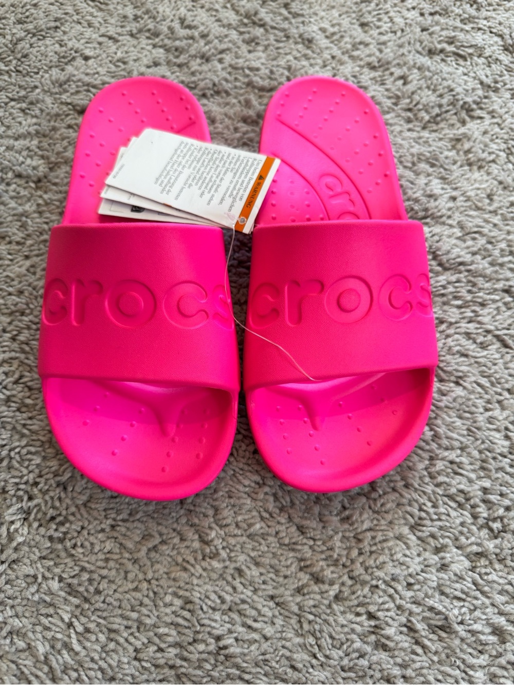 CROCS Classic Slide Sandals in Bright Pink